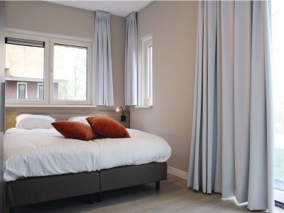 Holiday park Villa in Idskenhuizen mit Steg für 10 Von Belvilla - Features photo 17