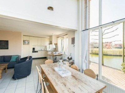Holiday house Bungalow in Zeeland with Stunning Waterside Views - Features photo 12