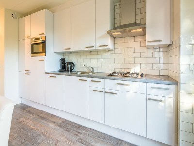 Holiday park Holiday Home on Texel with Spacious Garden - Features photo 10