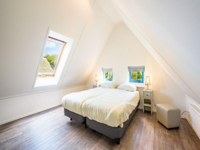 Holiday park Holiday Home on Texel with Spacious Garden - Features photo 11