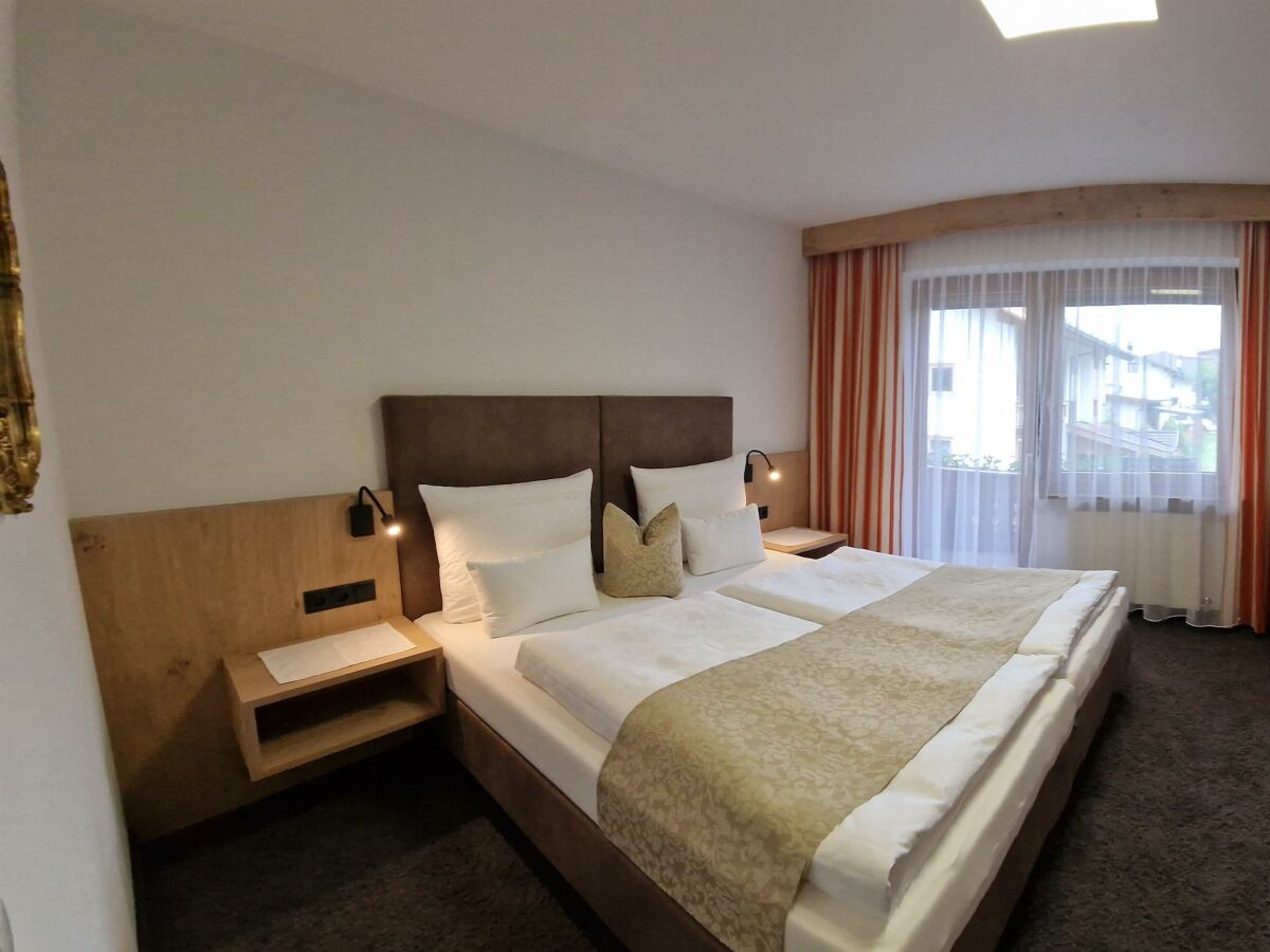 Holiday room Dreibettzimmer mit Dusche, WC