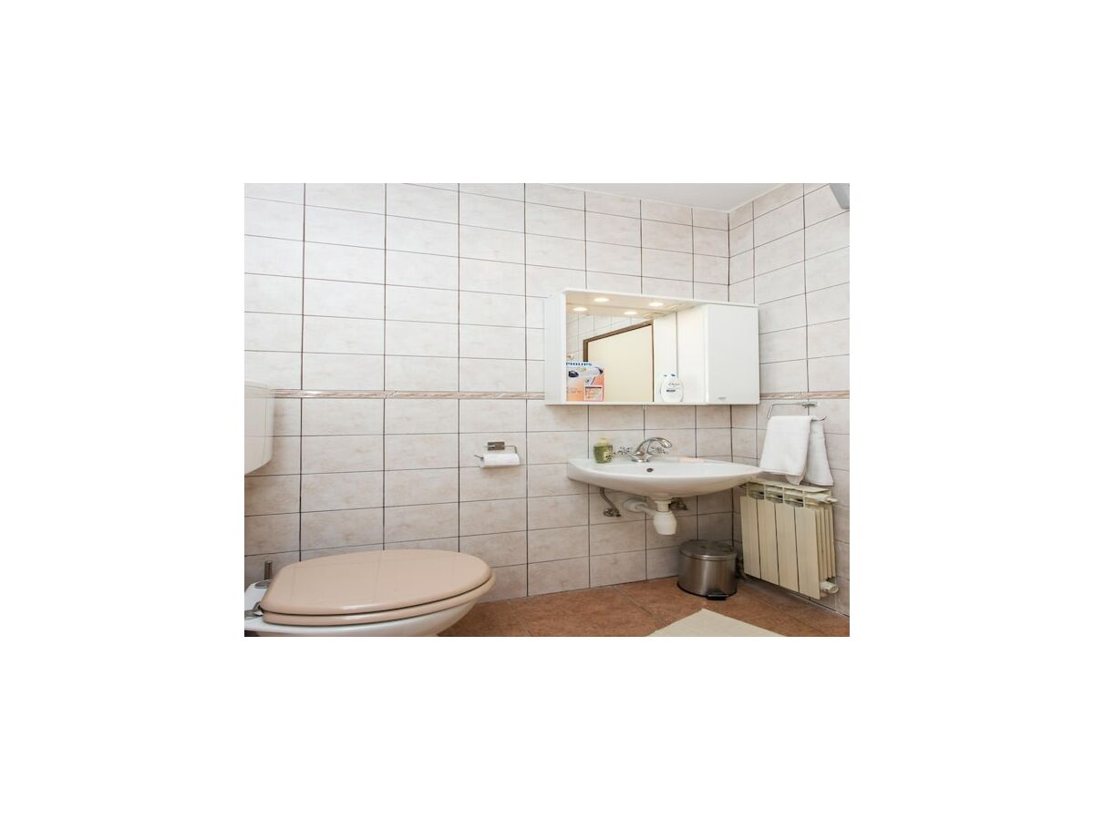 Apartment Apartment Hladilo Nostalgia - Comfort Two-Bedroom Apartment with Terrace and Partial Sea View - Features photo 4