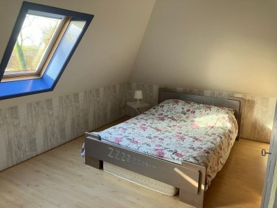 Holiday house Spacious holiday home close to the sea - Features photo 17