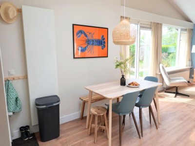 Holiday house Stylish bungalow at Duinland park with patio - Outdoor photo 6