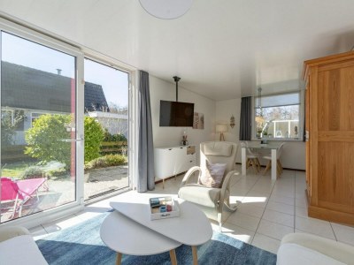 Holiday house Holiday home with pool by the sea in Sint Maartenszee - Holiday house