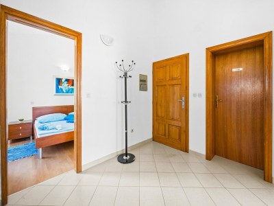 Apartment Familienfreundliches Apartment mit Meerblick - Features photo 8
