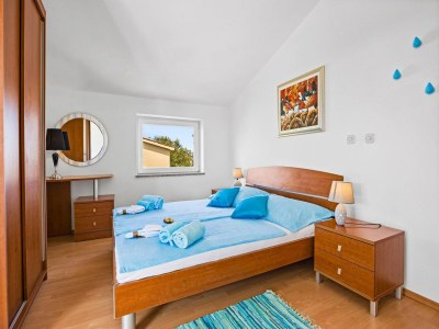 Apartment Familienfreundliches Apartment mit Meerblick - Features photo 12