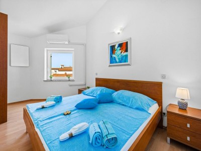 Apartment Familienfreundliches Apartment mit Meerblick - Features photo 13