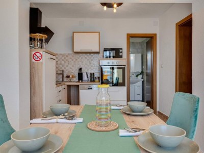 Apartment Tastefully designed apartment in Karlobag - Features photo 16