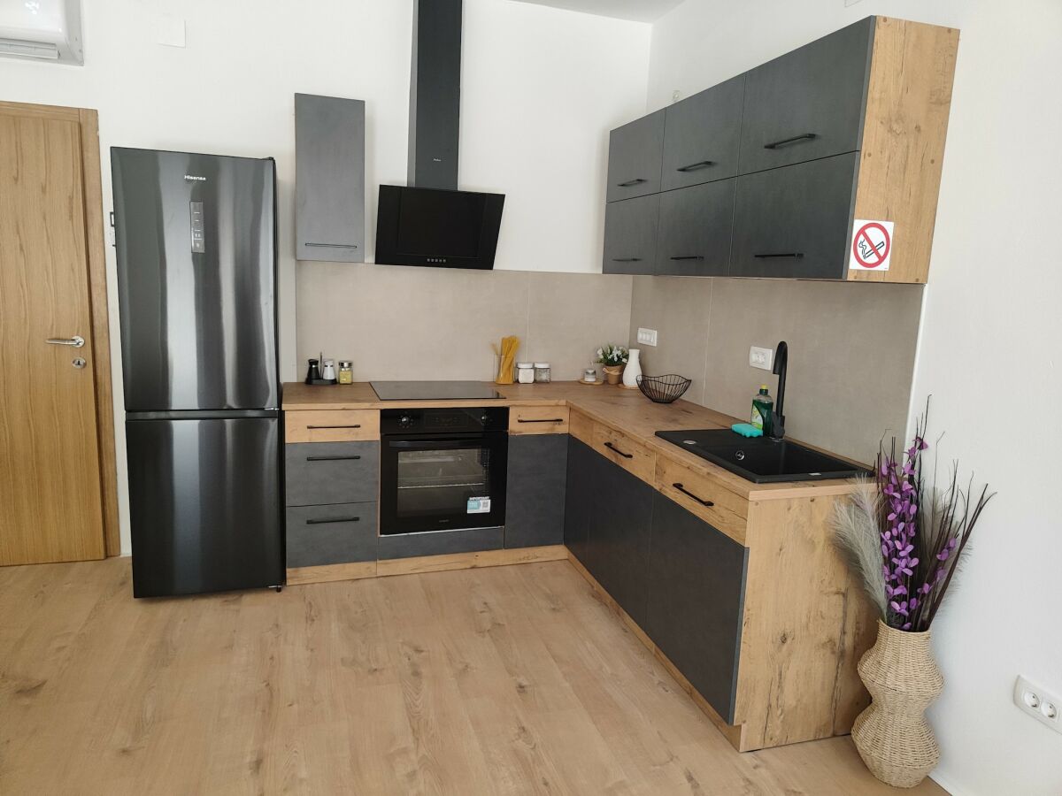 Apartment Wohnung mit Pool in Karlobag - Features photo 4