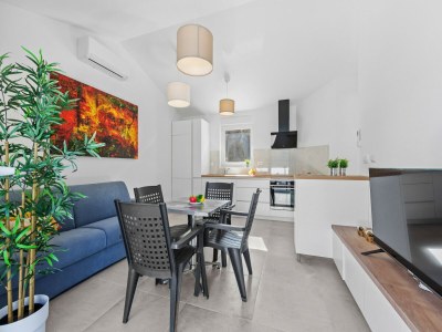 Apartment Attractive apartment in Peroj with terrace - Features photo 14