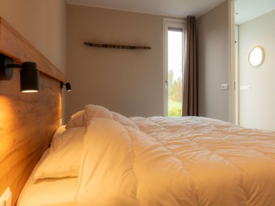 Holiday house Luxury holiday home surrounded by water & forest - Features photo 14