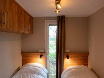Holiday house Luxury holiday home surrounded by water and forest - Features photo 11