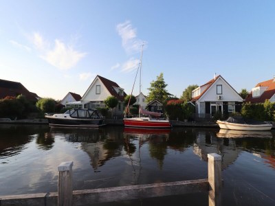 Holiday house Nice holiday home on the water in Grou in Grou - Holiday house