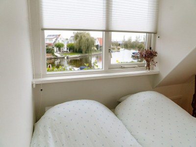 Holiday house Nice holiday home on the water in Grou - Features photo 13