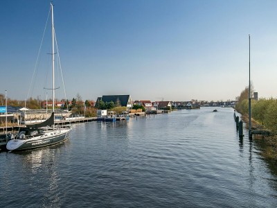 Holiday house Nice holiday home on the water in Grou - Environment photo 23