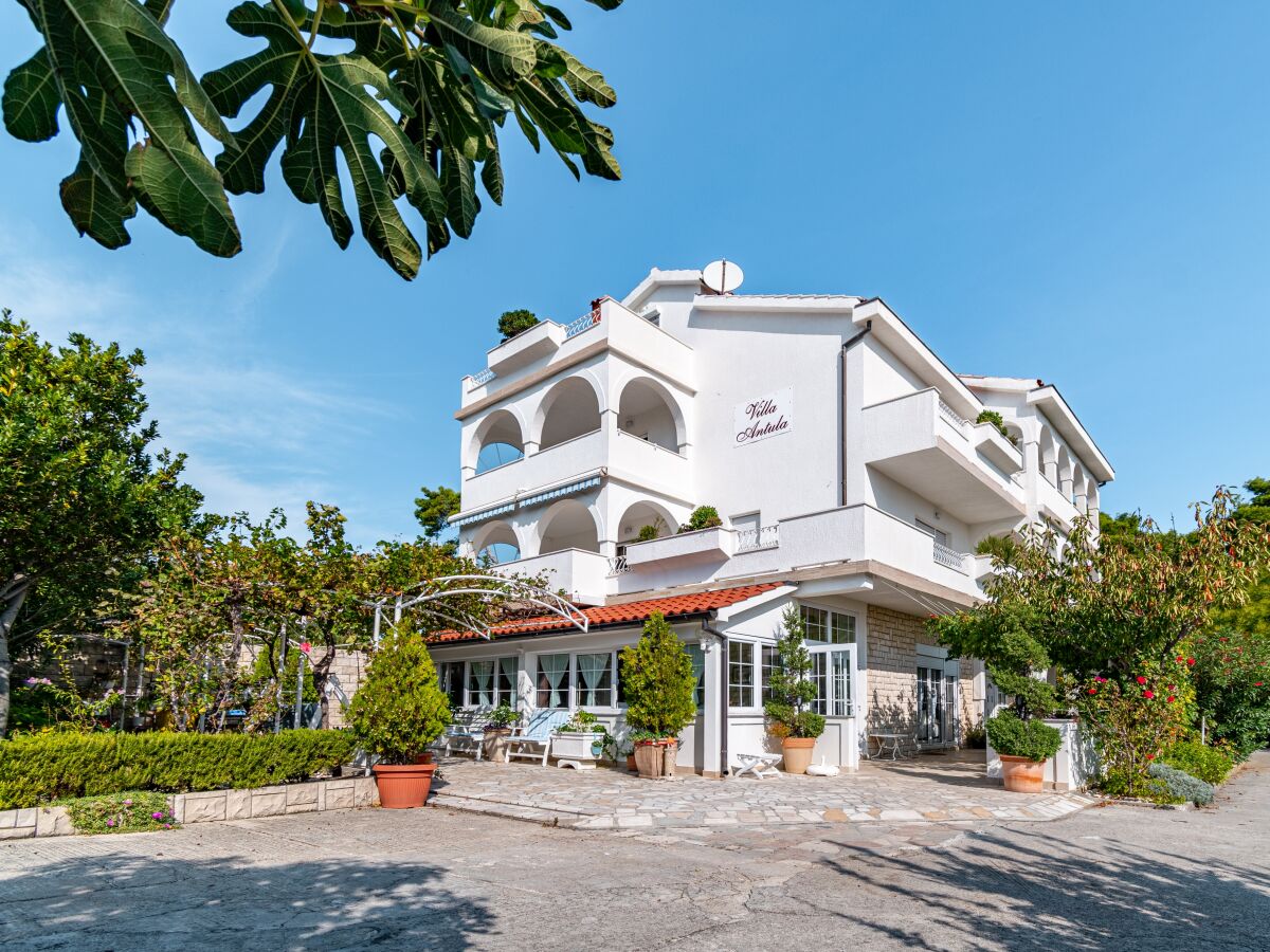 Apartment Two bedroom apartment with terrace and sea view Banjol, Rab A-5022-a - Outdoor photo 3