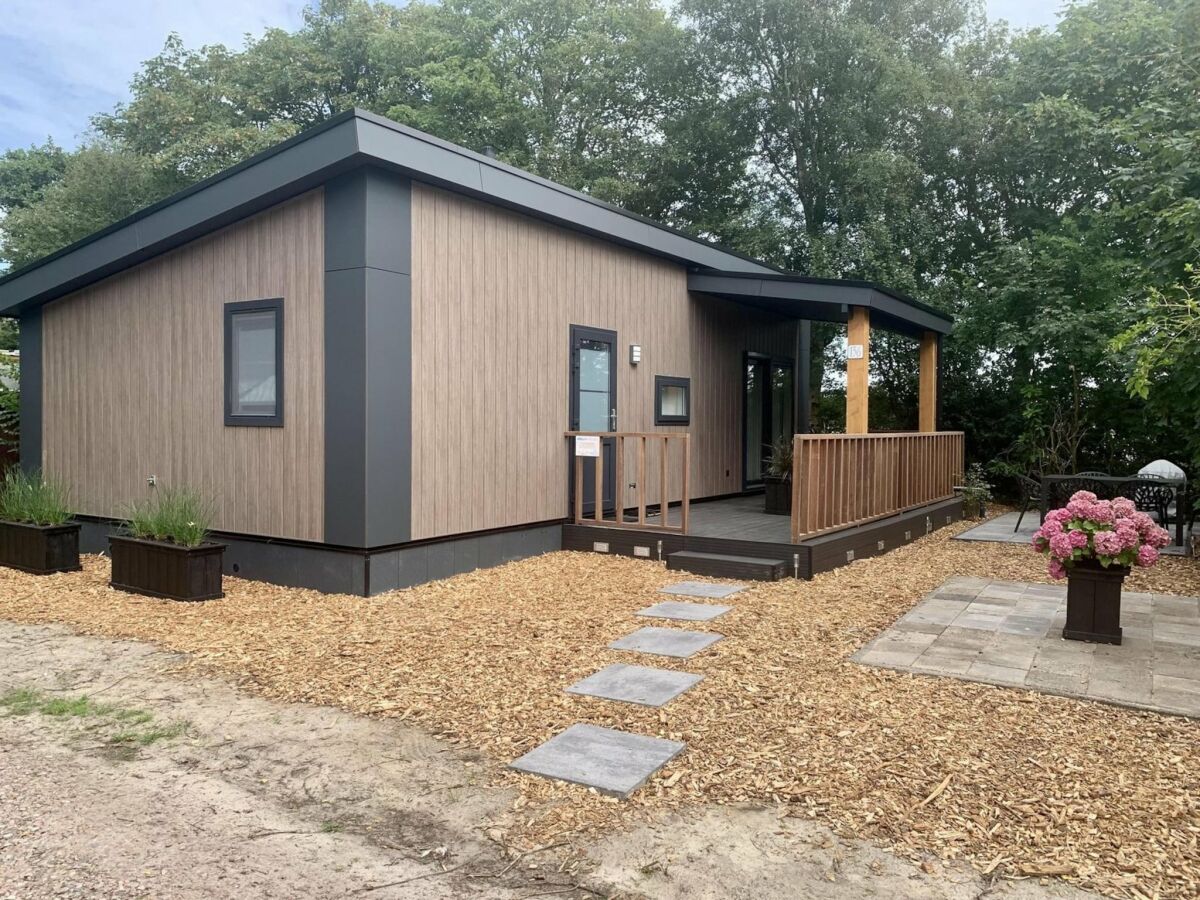 Holiday house Modern chalet with terrace, veranda