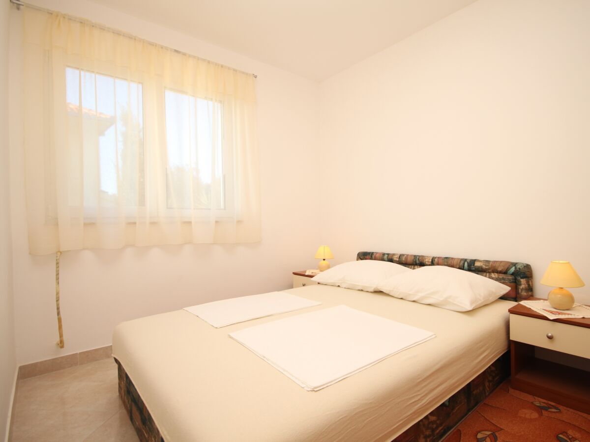 Apartment Two bedroom apartment with balcony and sea view Seget Vranjica, Trogir A-8507-a