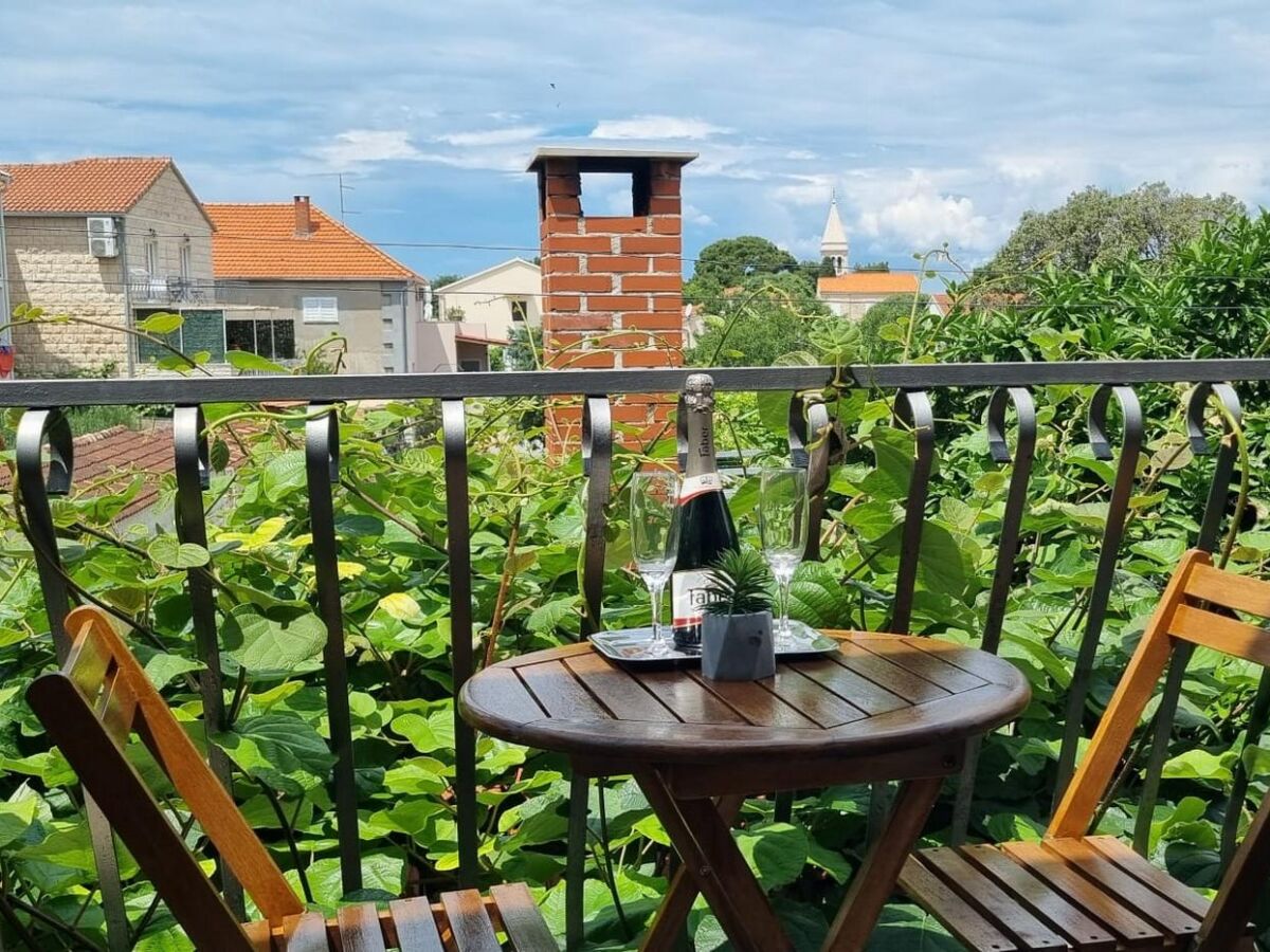 Holiday room with balcony Supetar, Brač S-5658-a
