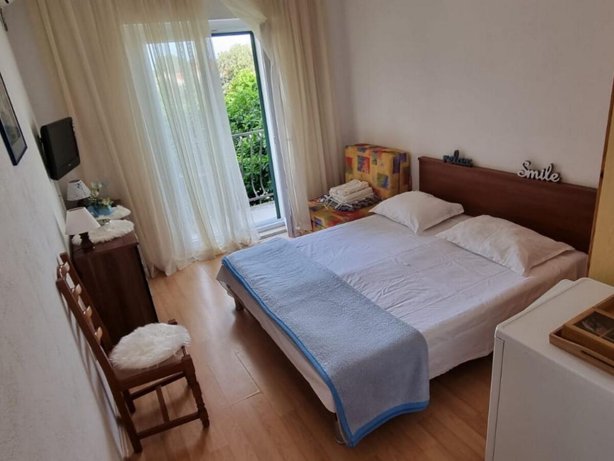 Holiday room with balcony Supetar, Brač S-5658-b