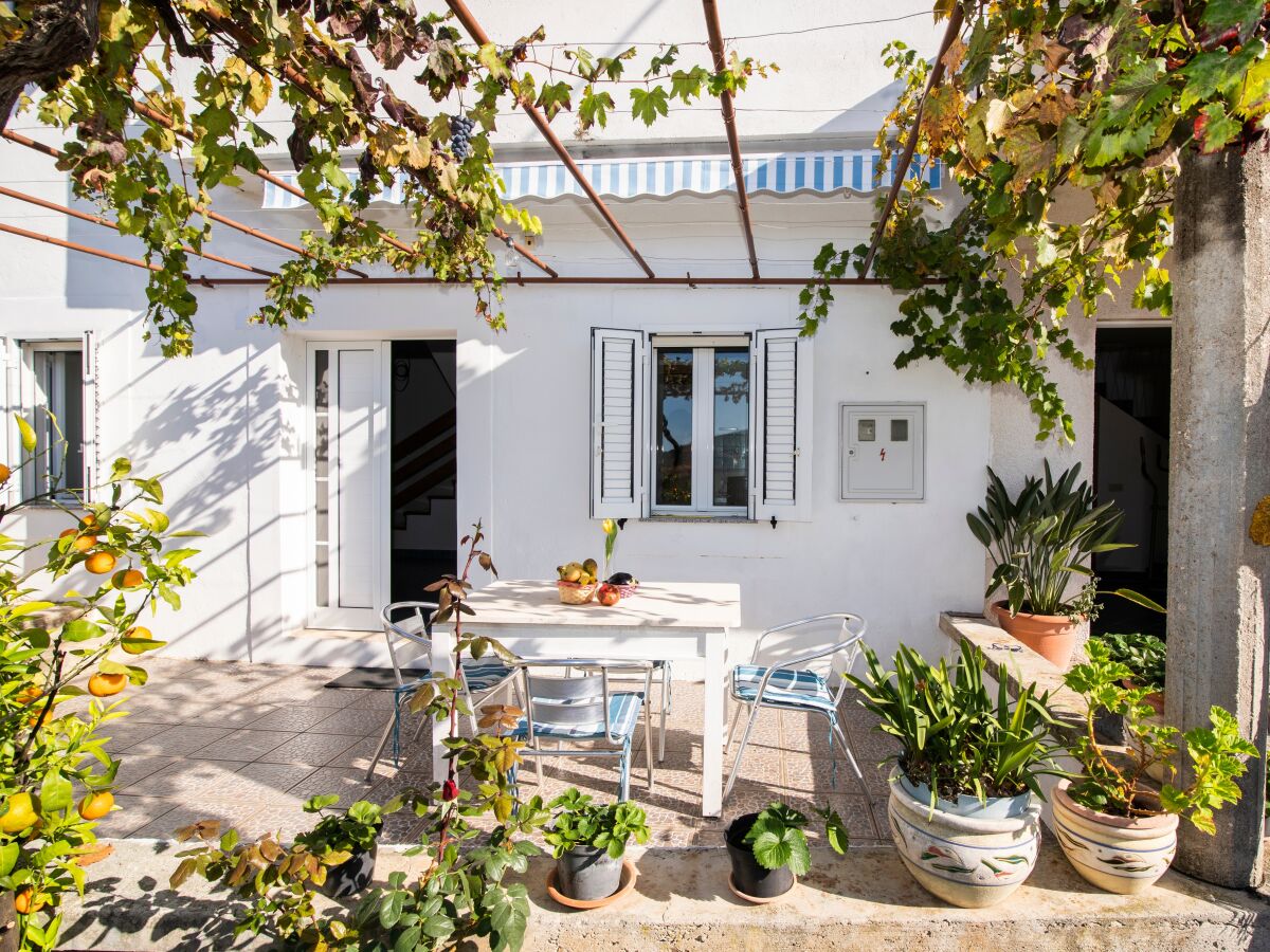 Holiday house Three bedroom house with terrace and sea view Drvenik Veliki, Drvenik K-22085