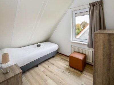 Holiday park Bungalow with Private Sauna by the Coast - Features photo 5