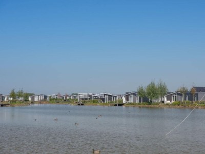 Holiday park Holiday Home in Zeeland with Workation Setup - Environment photo 26