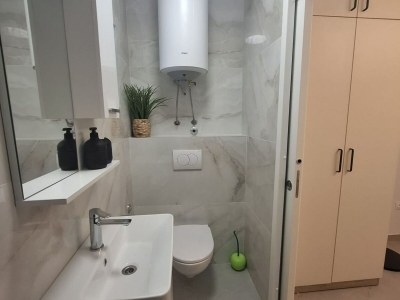 Apartment Apartment Jakić - One Bedroom Apartment with Garden View - Features photo 15
