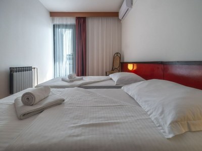 Apartment Hotel Issa - Twin Room Sea View - Features photo 26