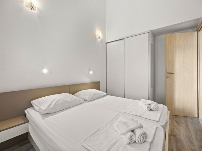 Apartment Bezauberndes Sommerapartment mit Meerblick - Features photo 14