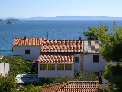 Apartment Two bedroom apartment with terrace and sea view Seget Vranjica, Trogir A-975-a in Seget Donji - Apartment