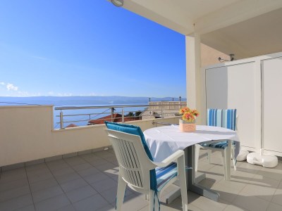 Apartment Studio flat with terrace and sea view Stanići, Omiš AS-2764-a in Omiš - Apartment