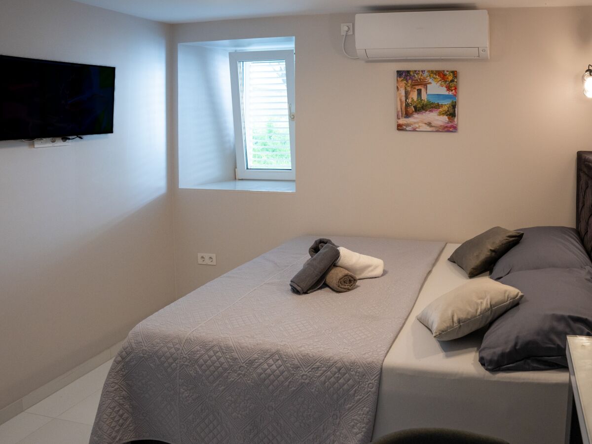 Apartment Studio flat with air-conditioning Poljana, Ugljan AS-8419-c