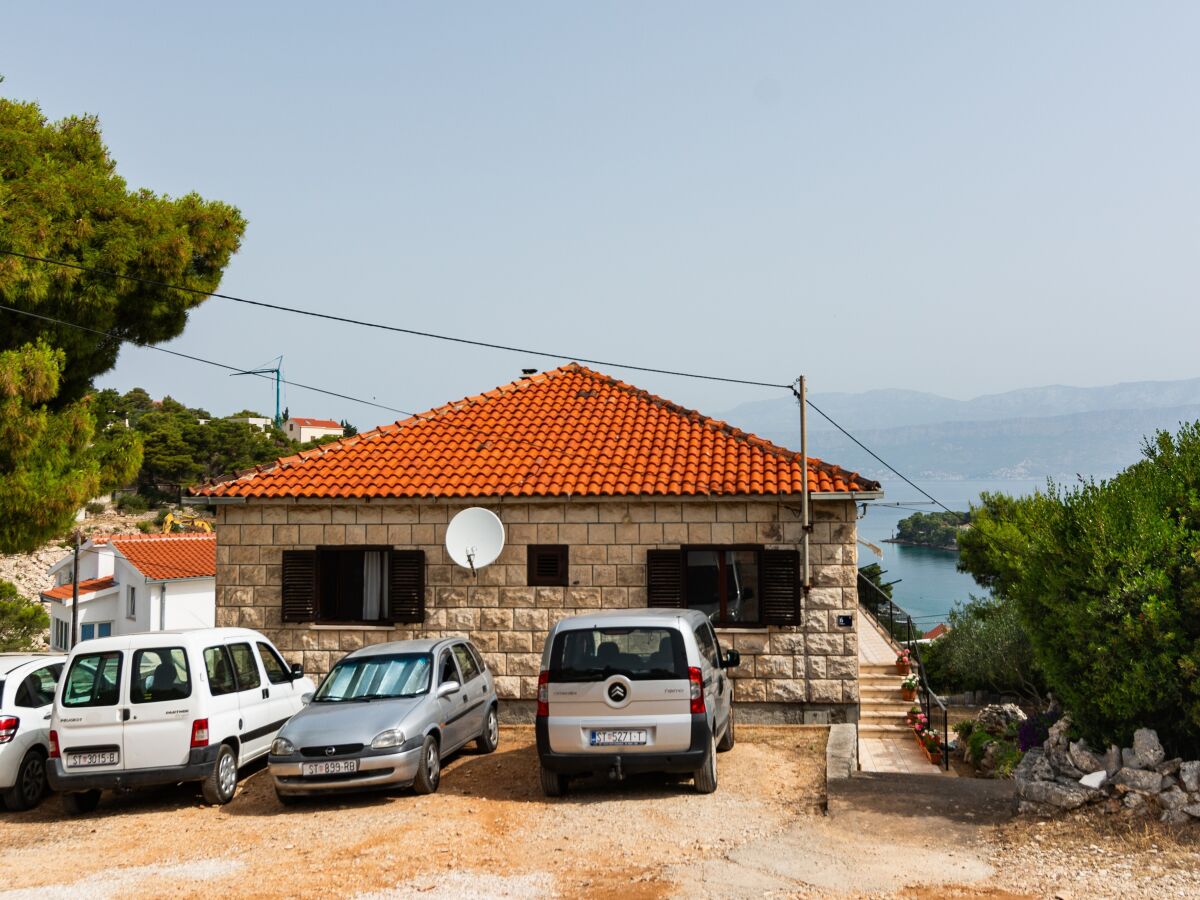Apartment Three bedroom apartment with terrace and sea view Splitska, Brač A-2867-a