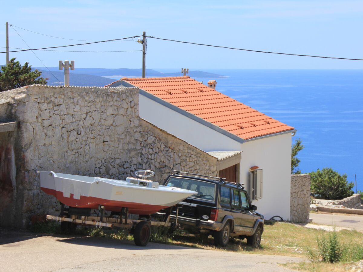 Holiday house Two bedroom house with terrace and sea view Ustrine, Cres K-8037