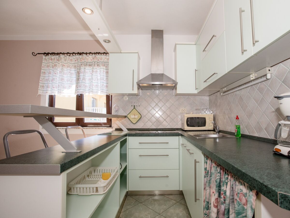 Apartment One bedroom apartment with terrace and sea view Barbat, Rab A-16723-b