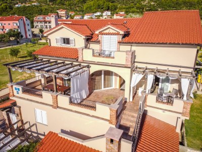 Apartment Two bedroom apartment with terrace Banjol, Rab A-19804-b - Outdoor photo 4