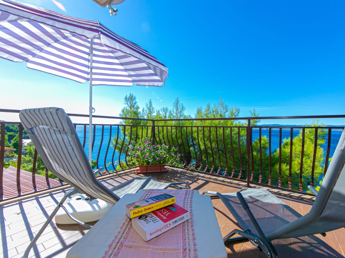 Apartment Three bedroom apartment with terrace and sea view Brela, Makarska A-20075-a