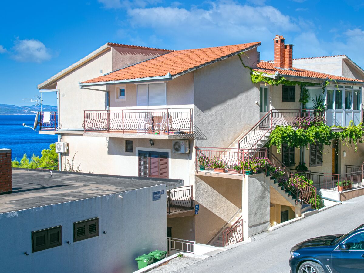Apartment Three bedroom apartment with terrace and sea view Brela, Makarska A-20075-a - Outdoor photo 3