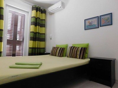 Apartment Two bedroom apartment with terrace Povlja, Brač A-21089-b in Povlja - Apartment