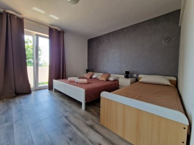 Apartment Two bedroom apartment with terrace and sea view Barbat, Rab A-22167-a - Outdoor photo 11