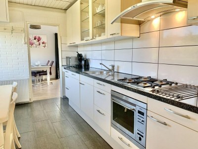 Holiday house Renovated bungalow with garden - Features photo 18