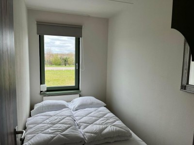 Holiday house Spacious apartment in Maartenszee dune - Features photo 32