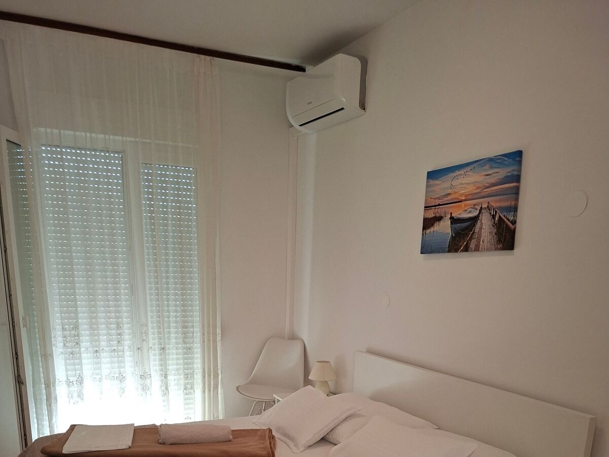 Holiday room with balcony Palit, Rab S-22221-b
