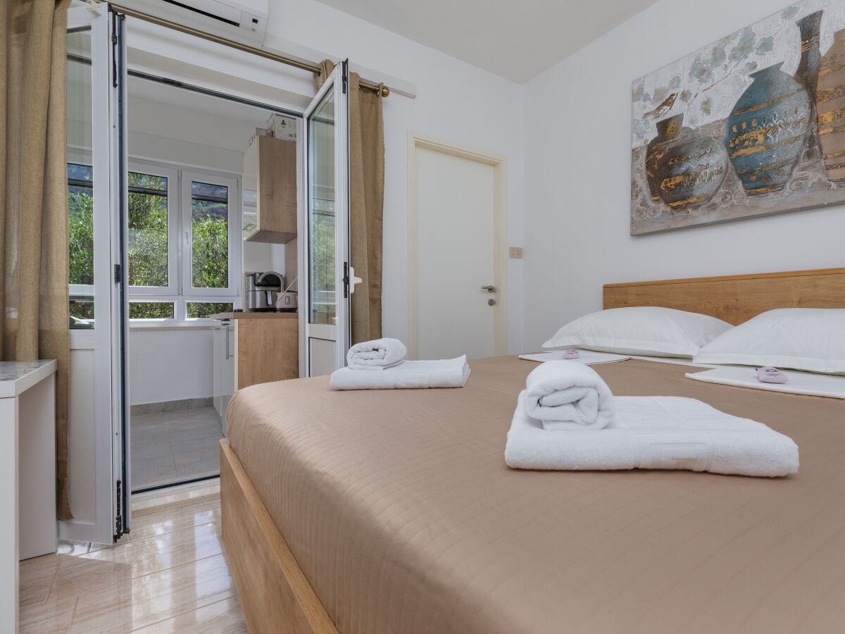Apartment Studio flat with terrace Tučepi, Makarska AS-22656-a