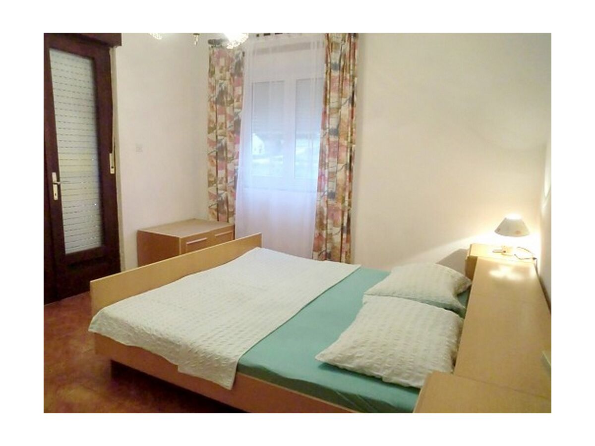 Apartment Three bedroom apartment with terrace and sea view Banjol, Rab A-16645-b - Outdoor photo 5