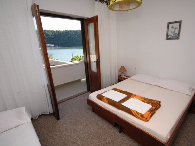 Apartment Four-bedroom apartment with terrace and sea view Kampor, Rab A-5051-a in Rab - Apartment