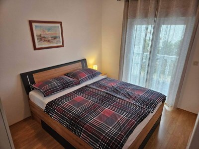 Apartment Two bedroom apartment with balcony and sea view Barbat, Rab A-4951-c in Rab - Apartment