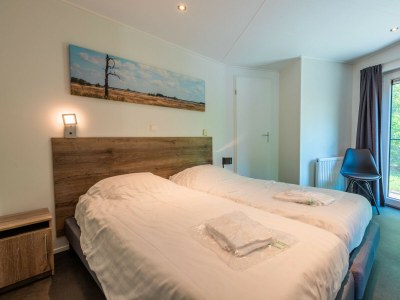Chalet Vakantiepark De Wiltzangh - Bosrand Wellness Cabin - Features photo 8